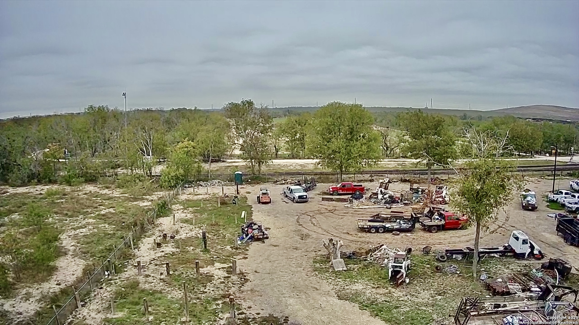 9221 Nelson Road San Antonio, TX 78252 - Photo 15 of 22 a view of a lake with a mountain