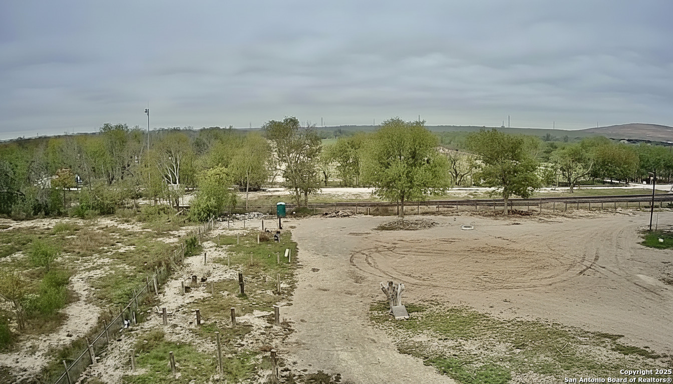 9221 Nelson Road San Antonio, TX 78252 - Photo 16 of 22 a view of lake view with residential houses and green space