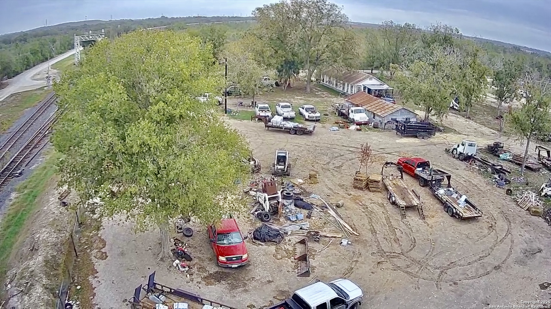 9221 Nelson Road San Antonio, TX 78252 - Photo 17 of 22 an aerial view of a house with a yard