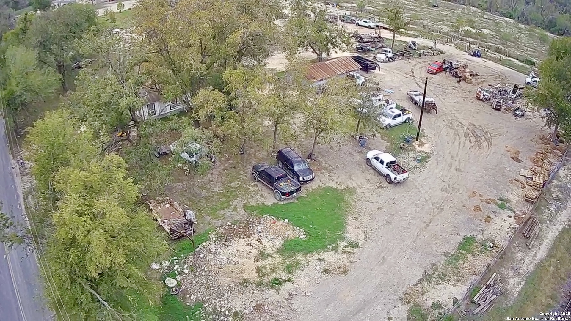 9221 Nelson Road San Antonio, TX 78252 - Photo 19 of 22 a backyard of a house with lots of green space