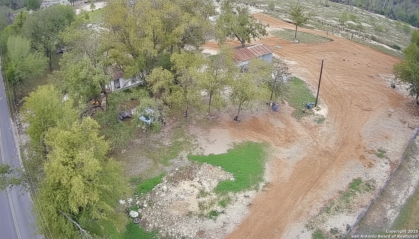9221 Nelson Road San Antonio, TX 78252 - Photo 20 of 22 a view of a yard with plants