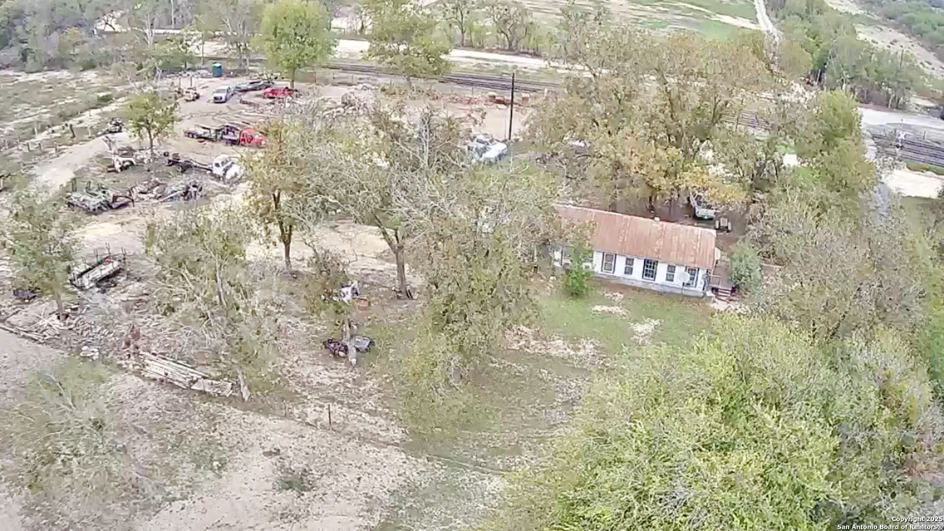 9221 Nelson Road San Antonio, TX 78252 - Photo 21 of 22 a sign that is on the side of a road