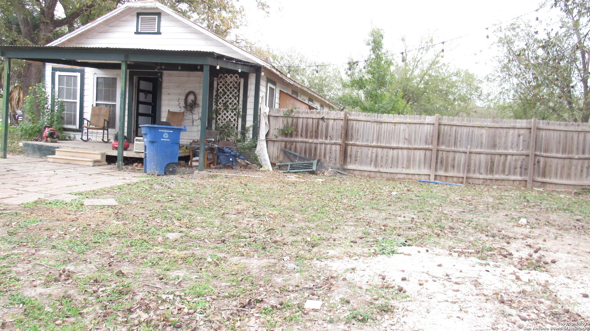 9221 Nelson Road San Antonio, TX 78252 - Photo 3 of 22 a view of a small house with yard and sitting area