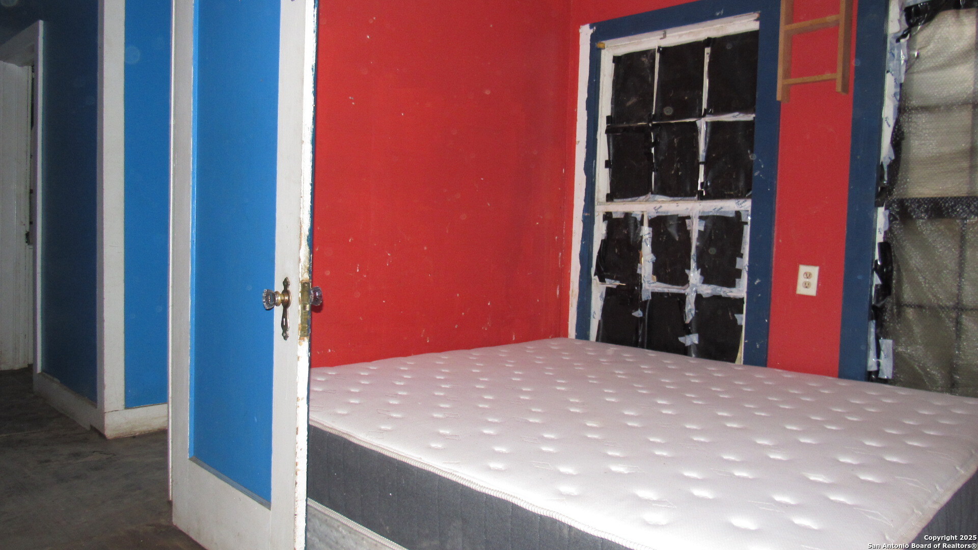 9221 Nelson Road San Antonio, TX 78252 - Photo 6 of 22 a view of empty room with windows