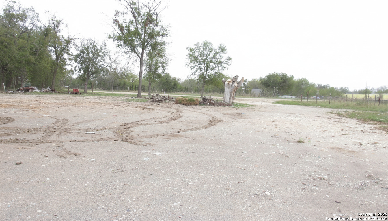 9221 Nelson Road San Antonio, TX 78252 - Photo 10 of 22 a view of empty field with trees