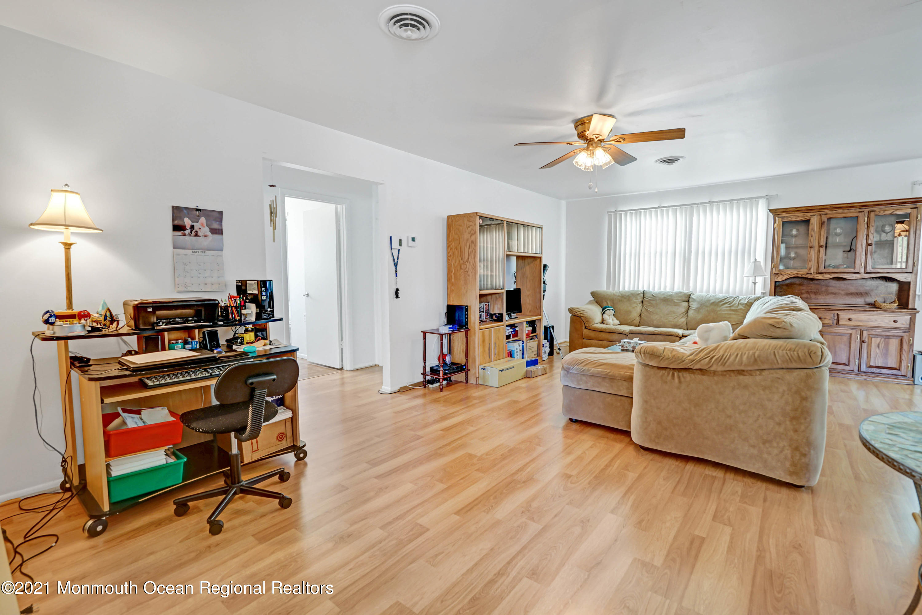 44 Churchill Road, Unit 71 Whiting, NJ 08759 - Photo 8 of 17 a living room with furniture and a wooden floor