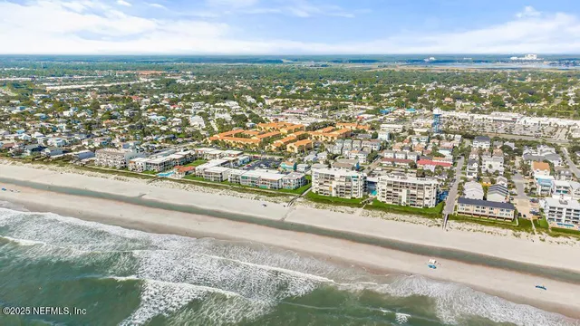 a view of a car parked in front of a house