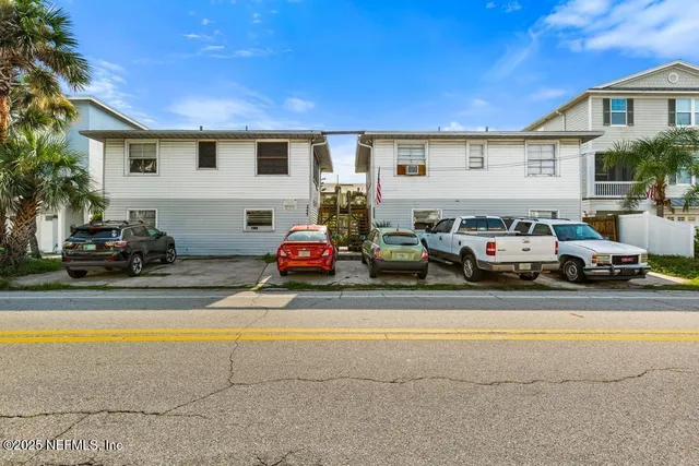 an aerial view of residential building and lake view