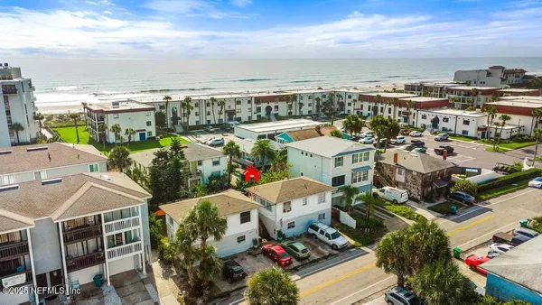 a view of balcony with potted plants