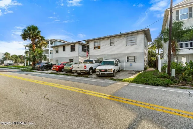 a car parked in front of a house