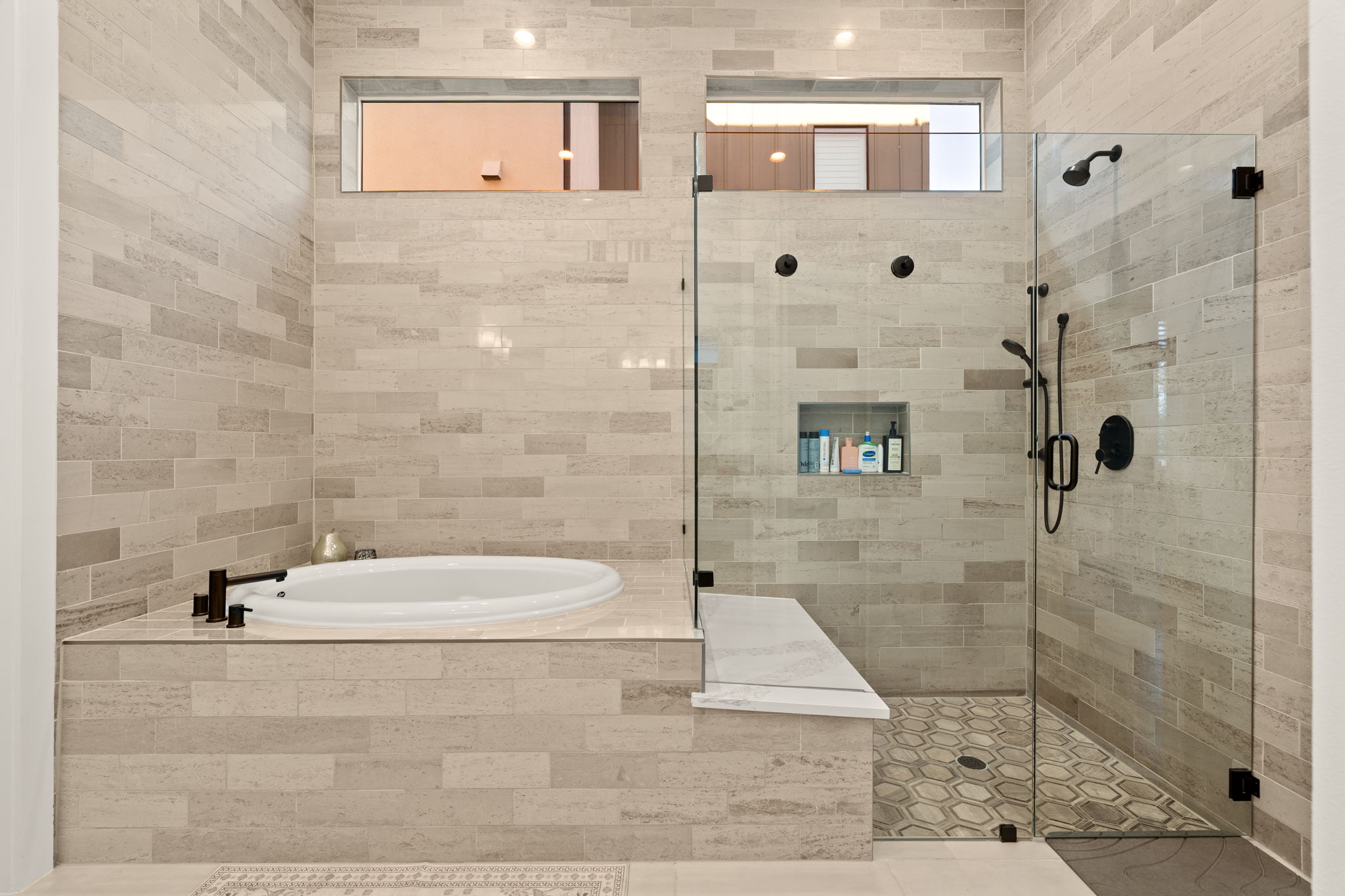 4003 Independent Way, Unit 182 Austin, TX 78731 - Photo 17 of 40 Bathroom featuring a bath and a stall shower