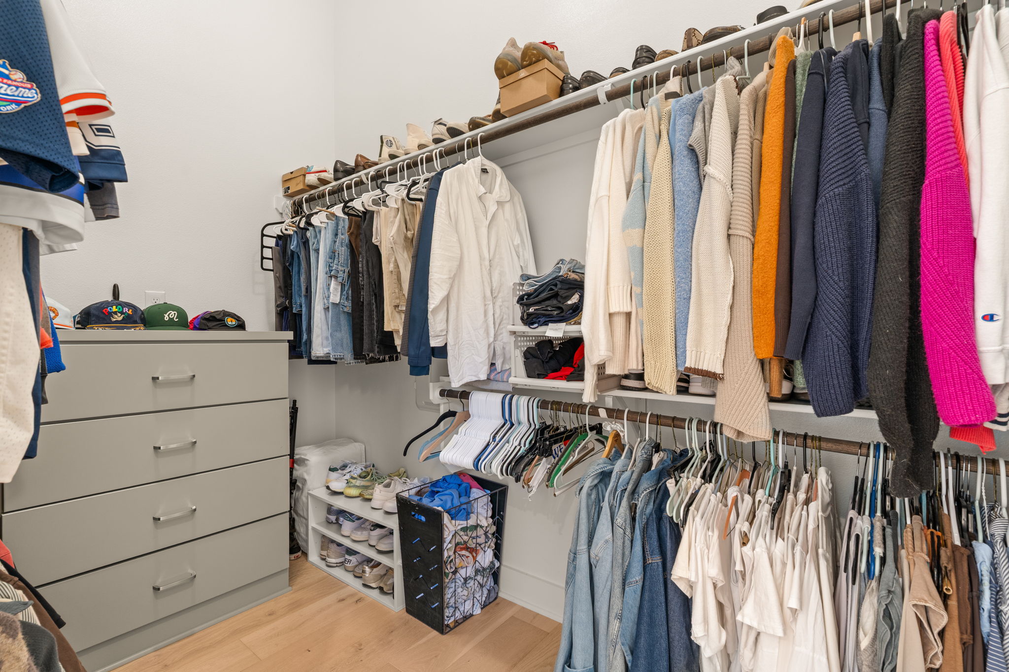 4003 Independent Way, Unit 182 Austin, TX 78731 - Photo 18 of 40 a view of walk in closet with clothes and shoes