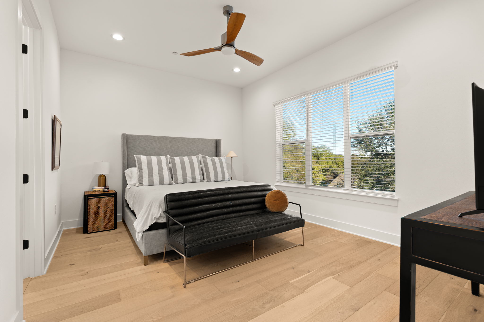 4003 Independent Way, Unit 182 Austin, TX 78731 - Photo 22 of 40 a bedroom with furniture and a window