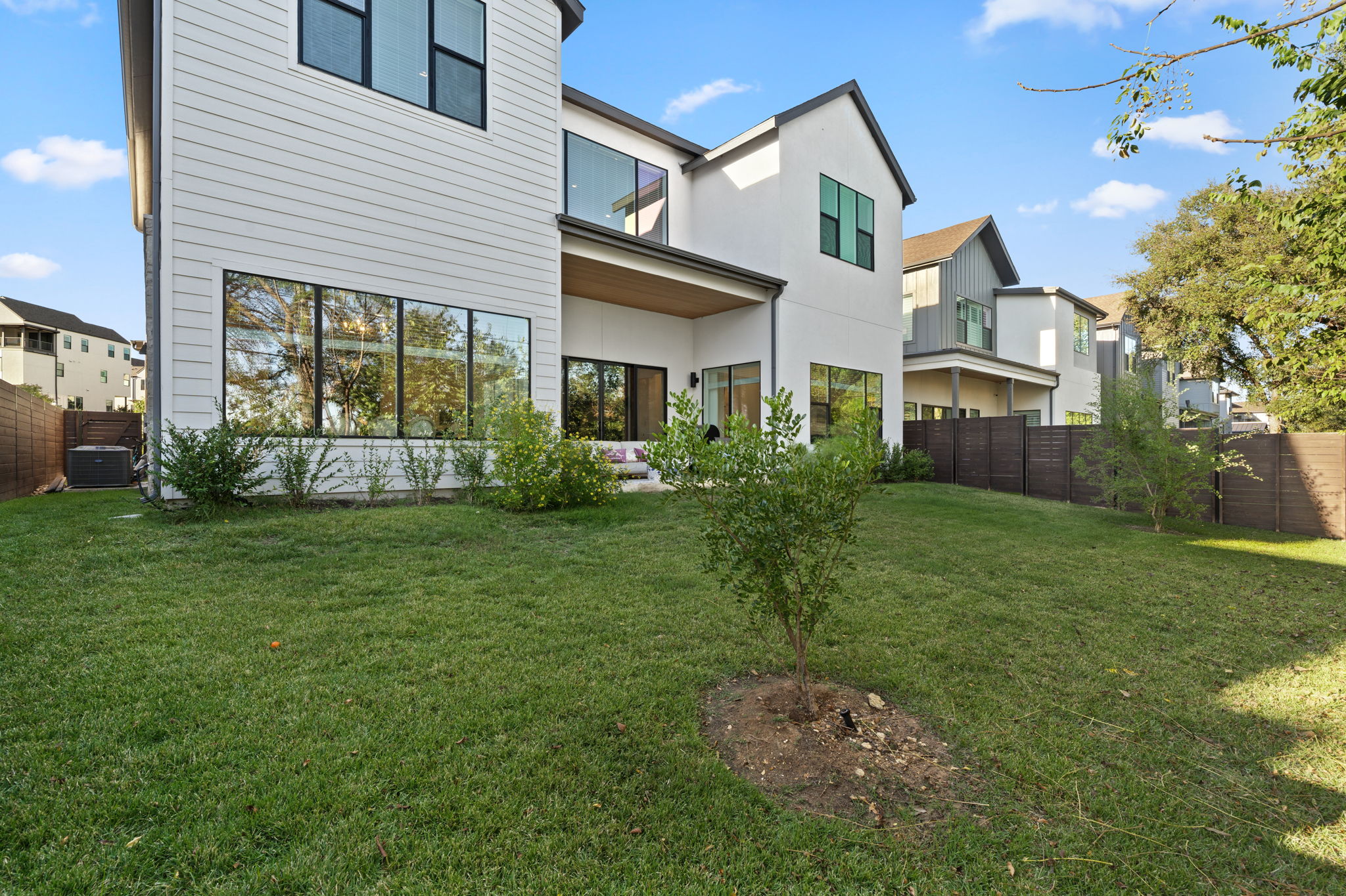 4003 Independent Way, Unit 182 Austin, TX 78731 - Photo 32 of 40 a front view of a house with garden