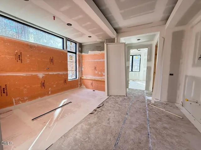 a view of livingroom with furniture and windows