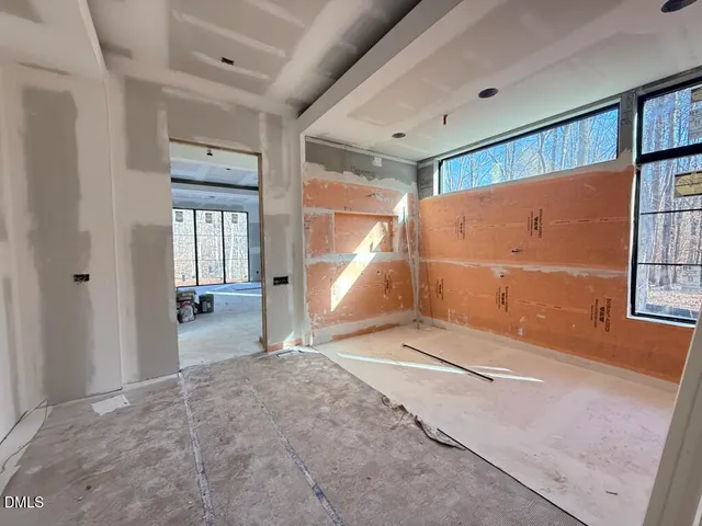 an empty room with windows