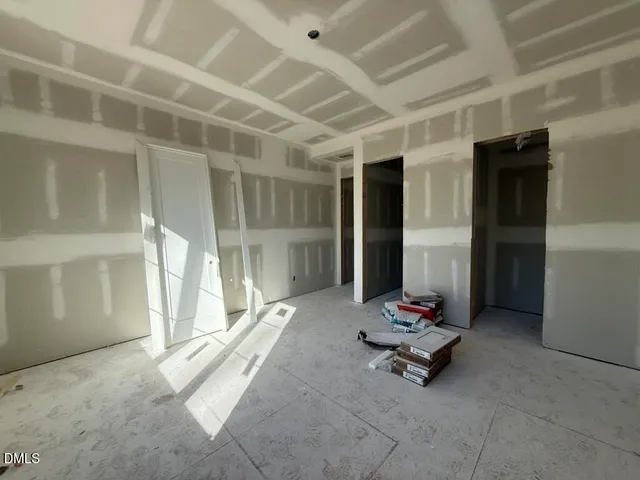 a view of empty room with windows