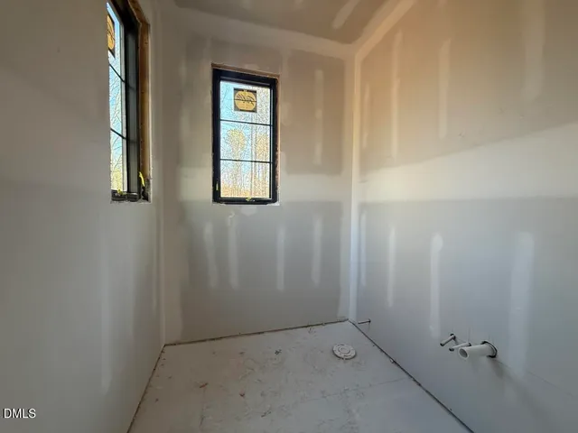 a kitchen with stainless steel appliances granite countertop sink stove and cabinets