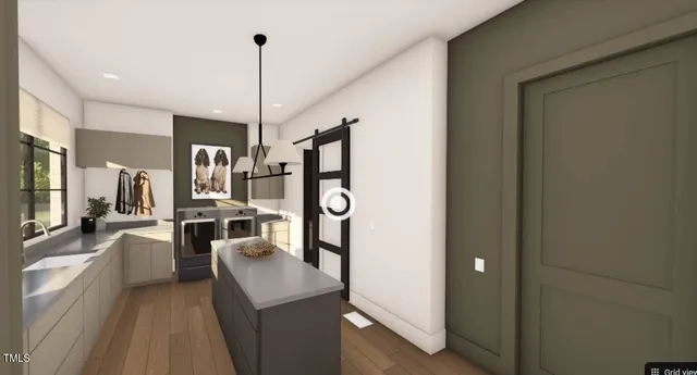 a hallway with a table and couch