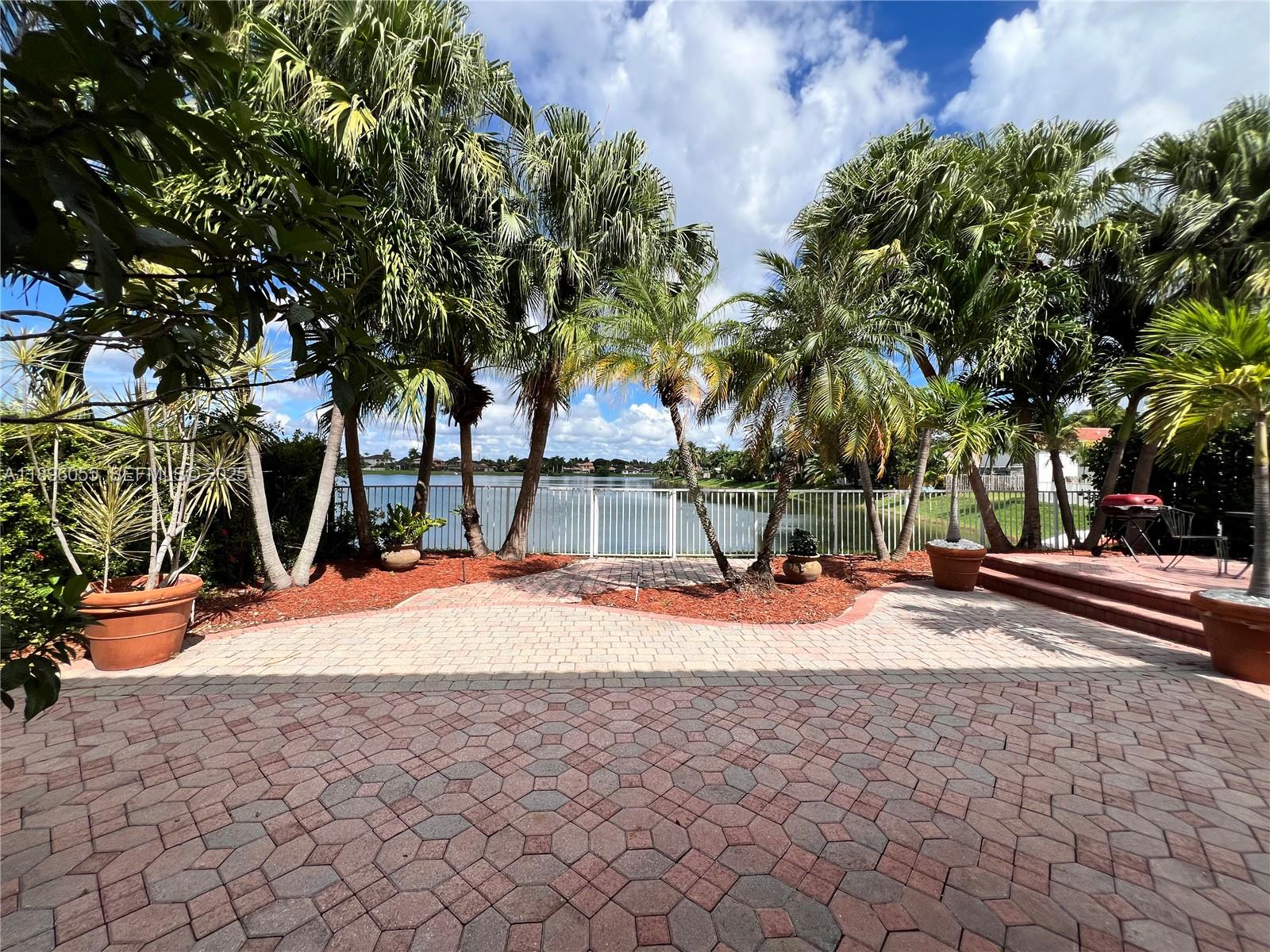 12247 Southwest 140th Street Miami, FL 33186 - Photo 19 of 86 a view of road and trees