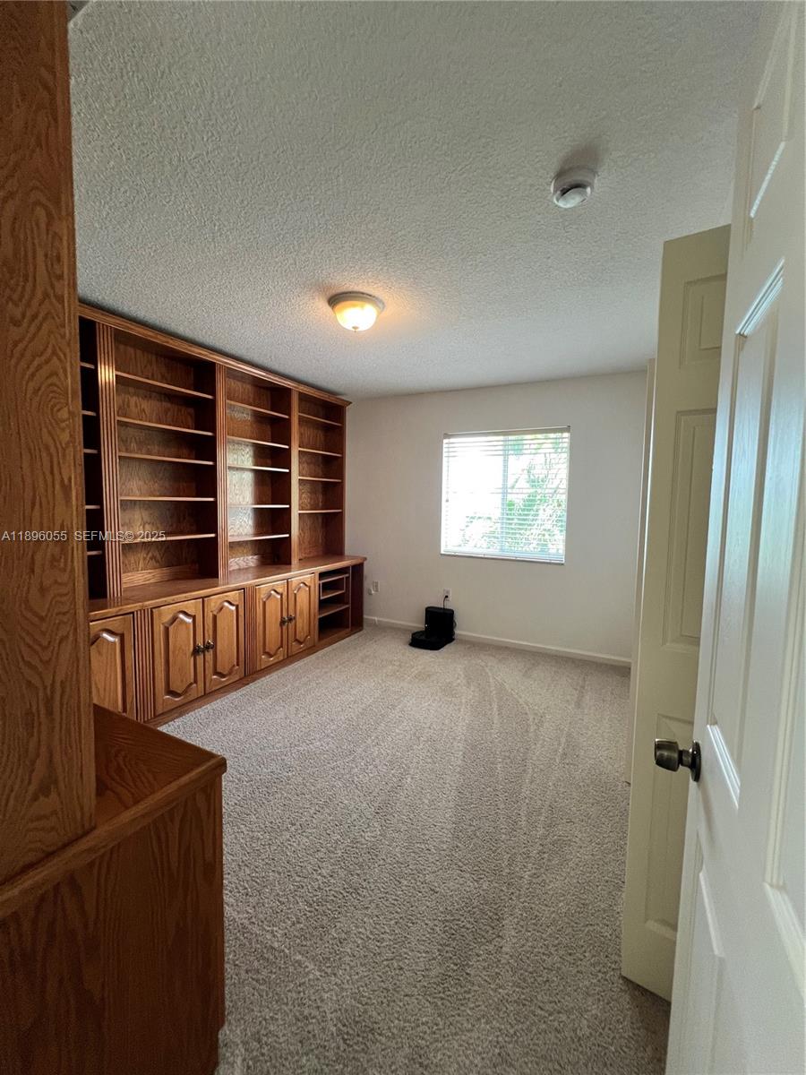 12247 Southwest 140th Street Miami, FL 33186 - Photo 49 of 86 a view of an empty room and window