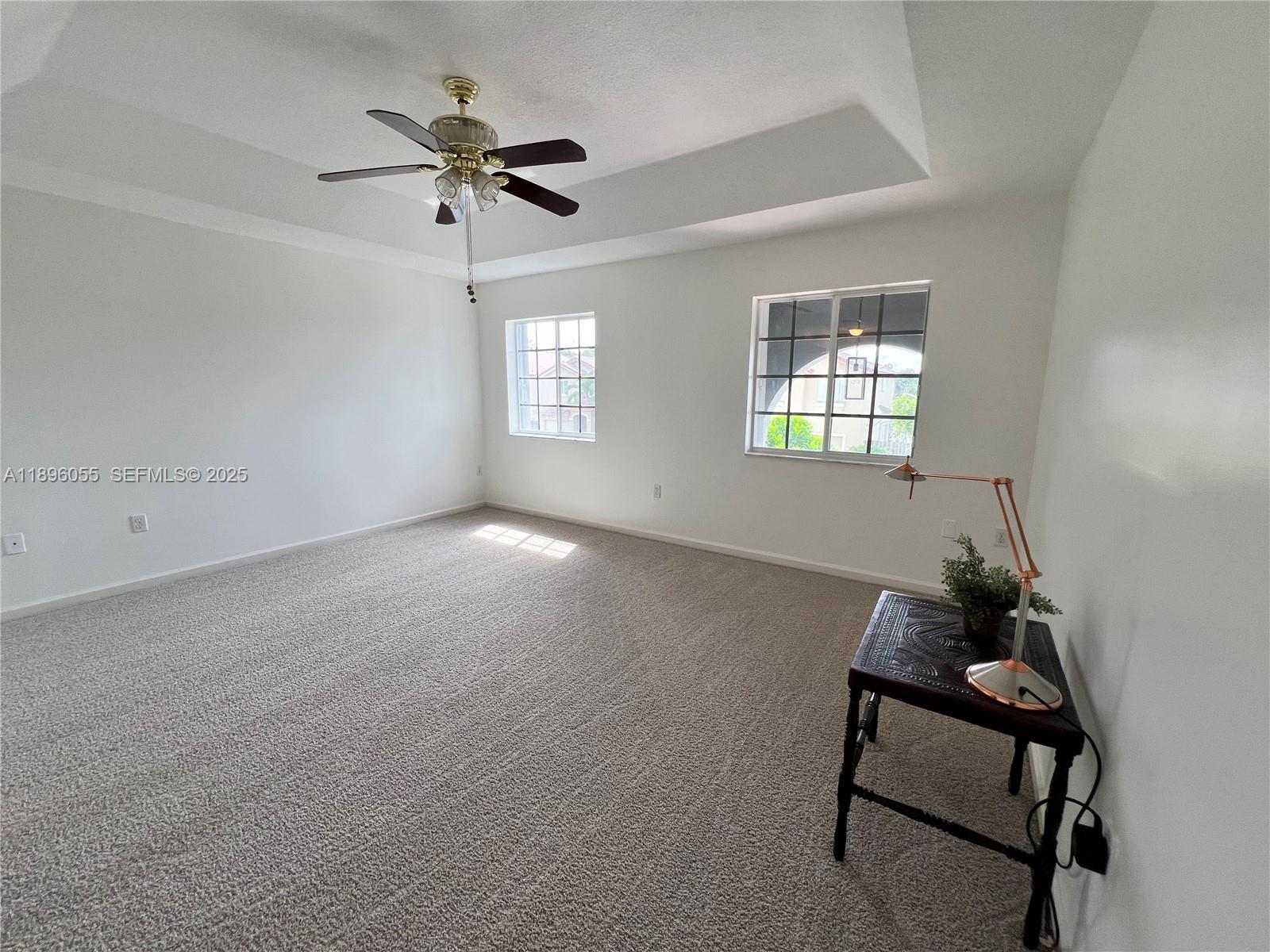 12247 Southwest 140th Street Miami, FL 33186 - Photo 65 of 86 a view of wooden floor and windows in a room