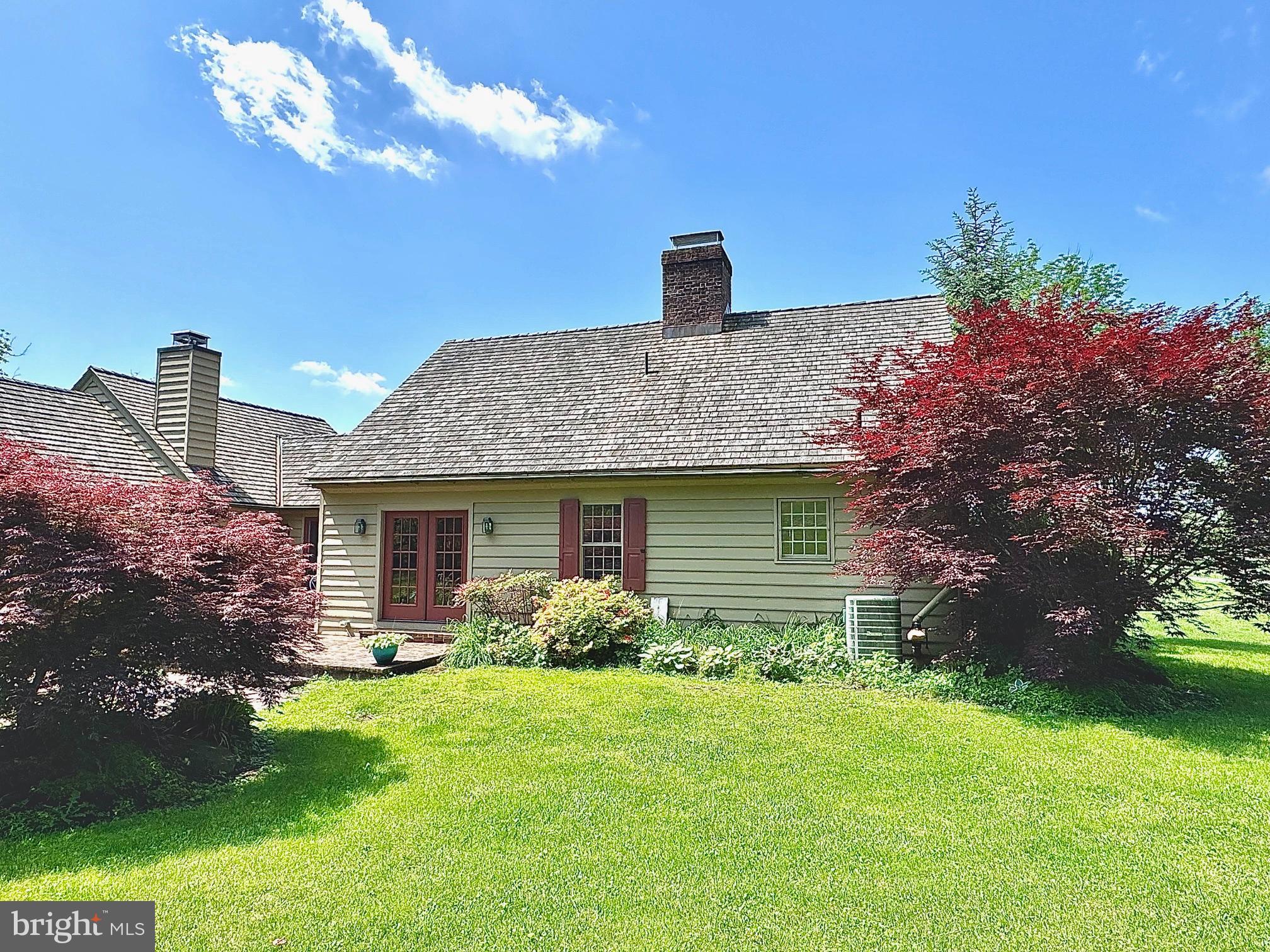1621 Limekiln Road Oley, PA 19547 - Photo 12 of 75 a front view of a house with garden