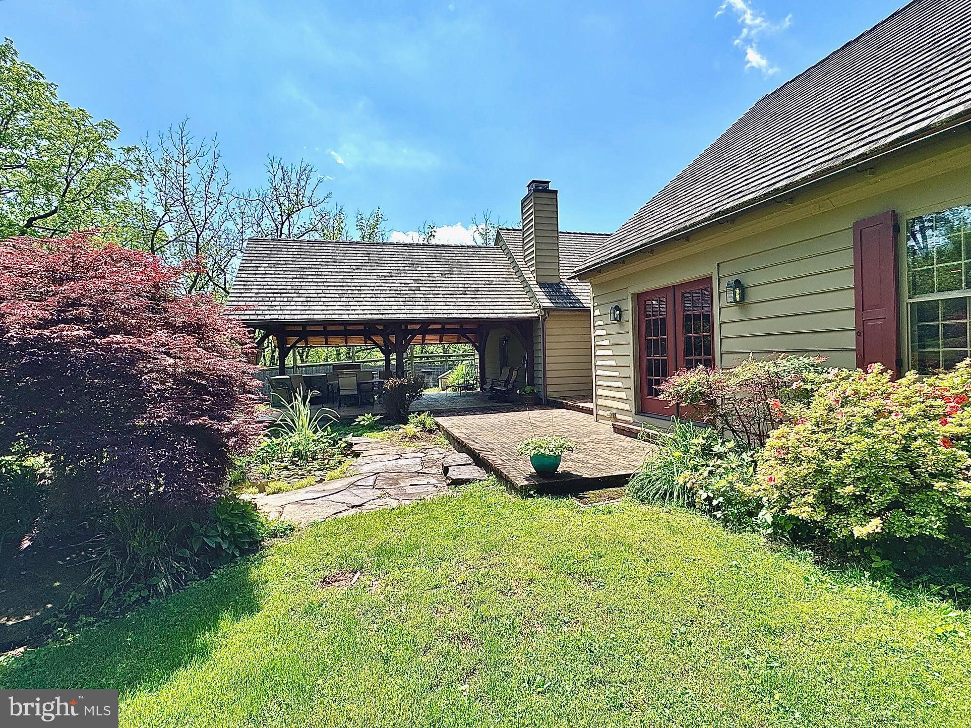 1621 Limekiln Road Oley, PA 19547 - Photo 13 of 75 a front view of a house with garden