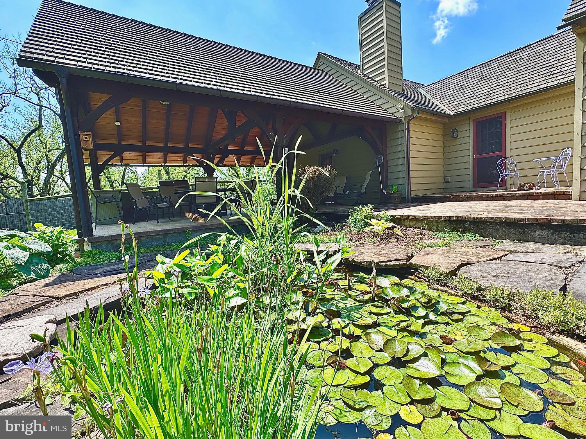 1621 Limekiln Road Oley, PA 19547 - Photo 15 of 75 a backyard of a house with lots of green space