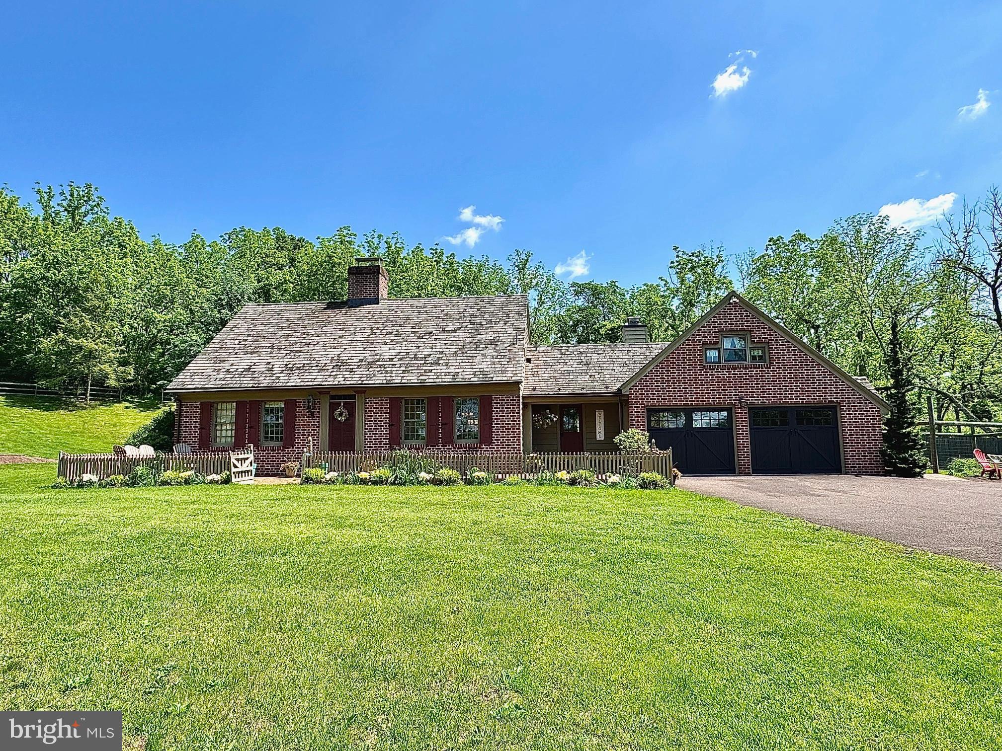 1621 Limekiln Road Oley, PA 19547 - Photo 2 of 75 a front view of house with yard and green space