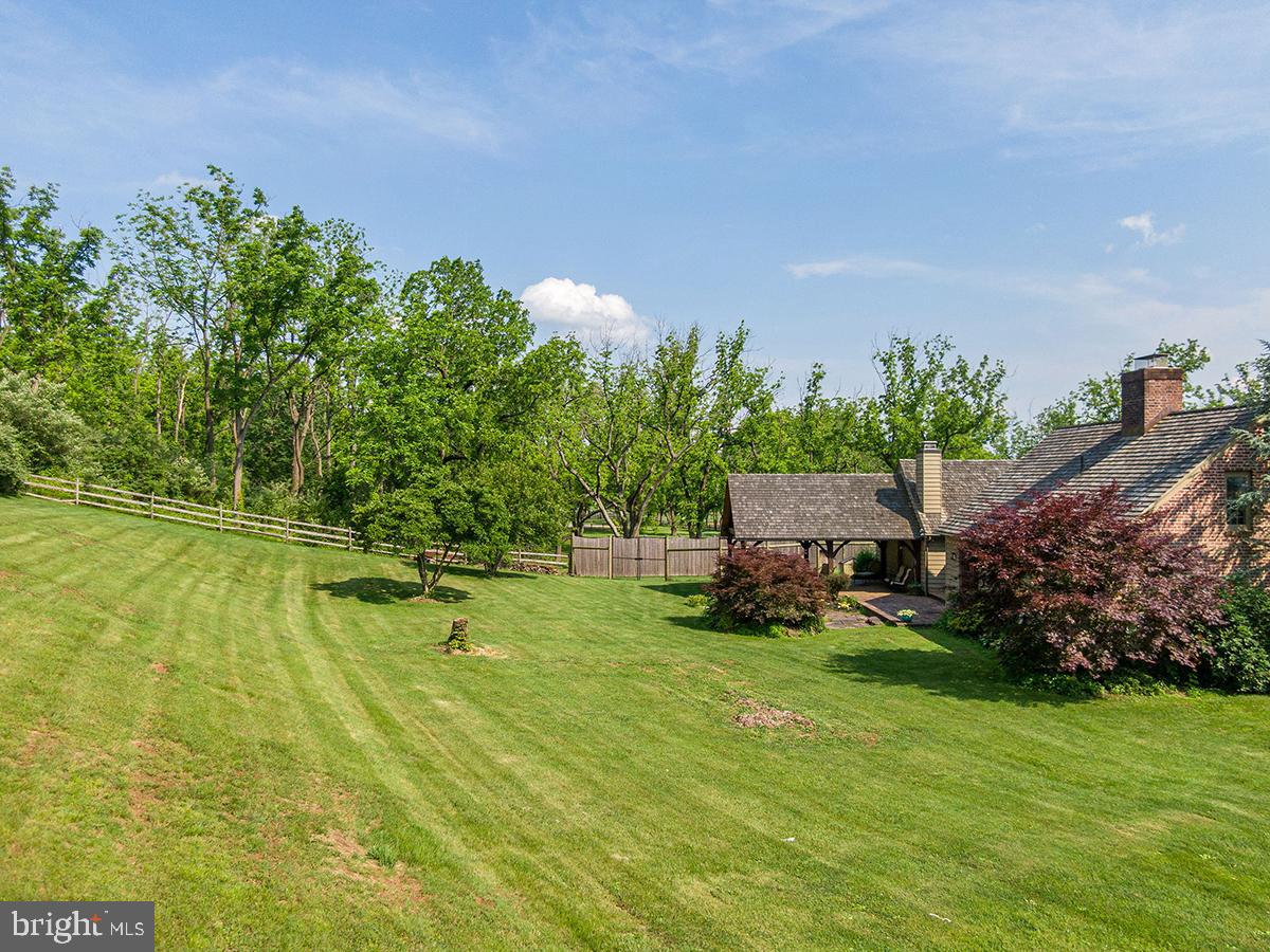 1621 Limekiln Road Oley, PA 19547 - Photo 23 of 75 a backyard of a house with lots of green space