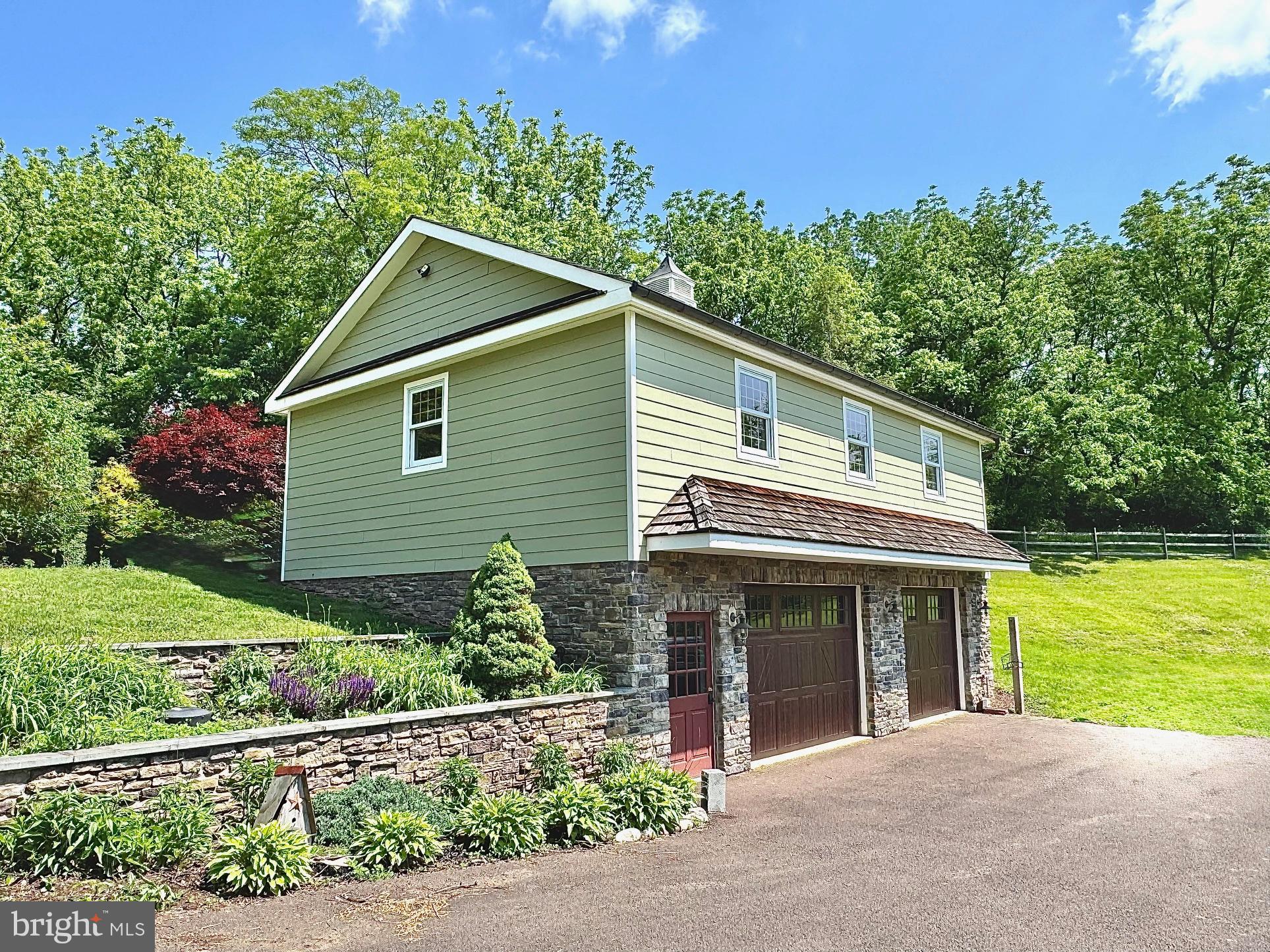 1621 Limekiln Road Oley, PA 19547 - Photo 27 of 75 a front view of a house with garden