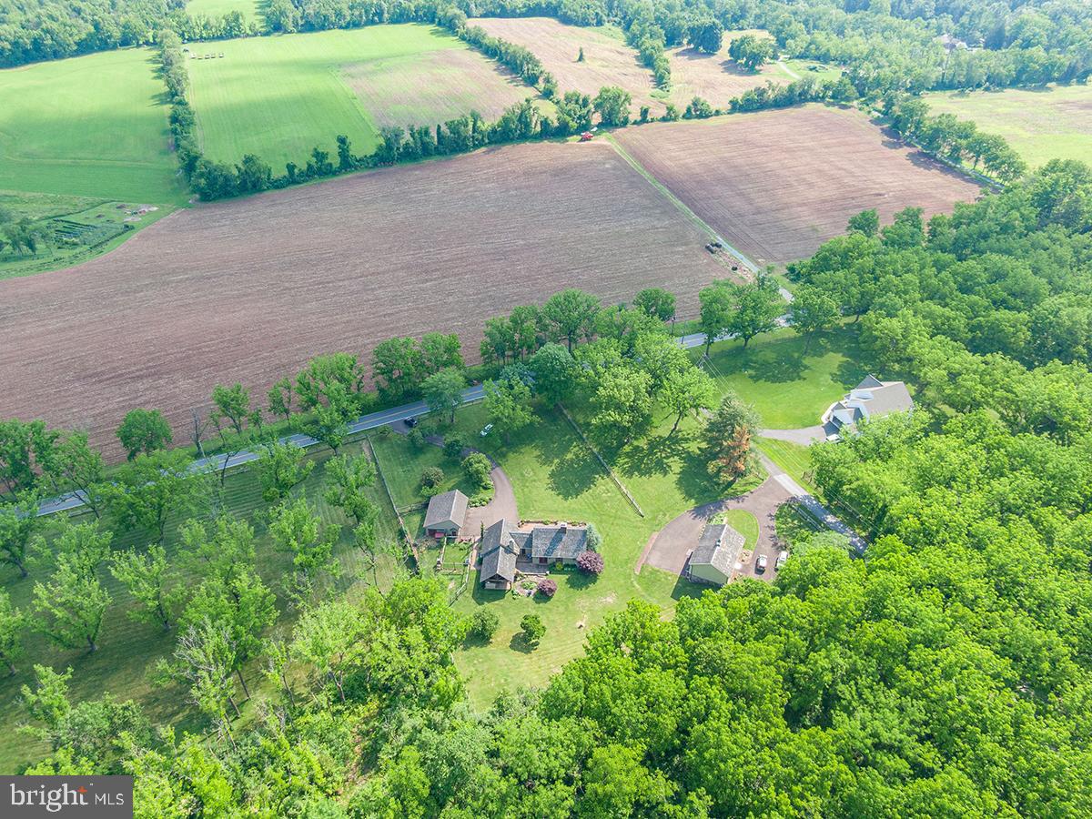 1621 Limekiln Road Oley, PA 19547 - Photo 34 of 75 a backyard of a house with a yard and lake view