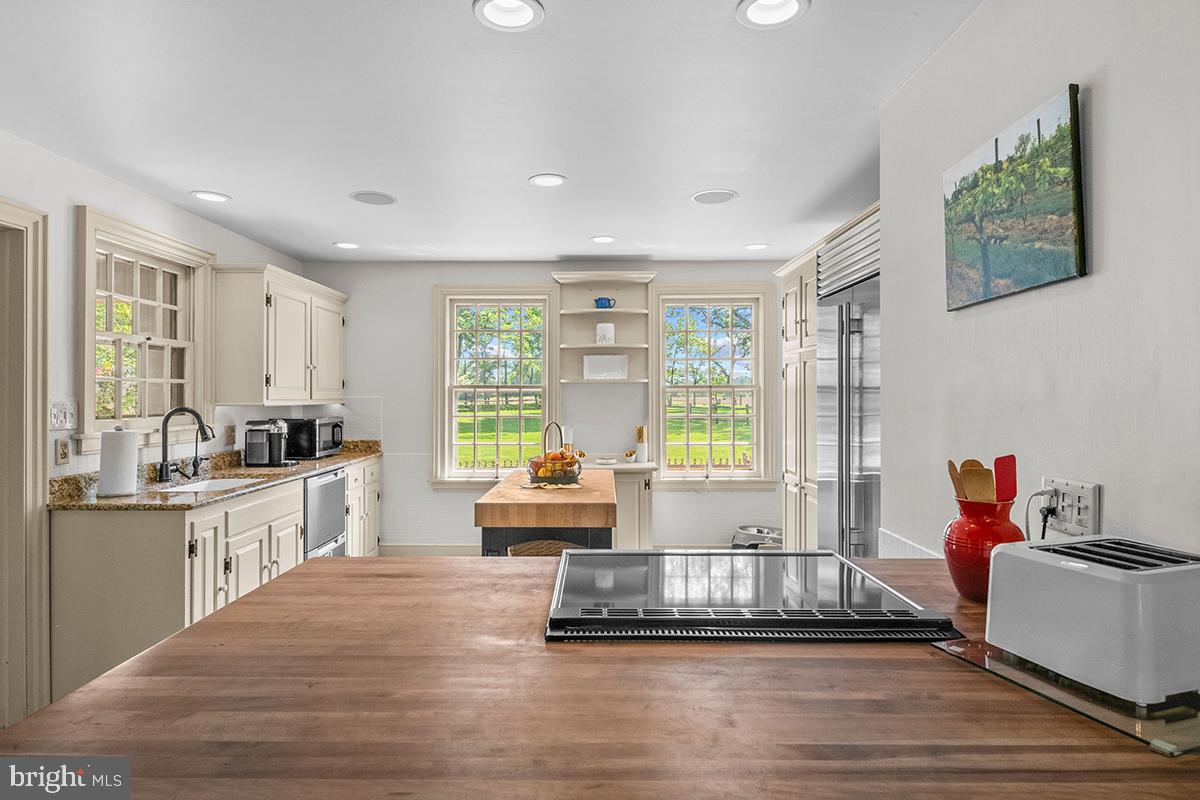 1621 Limekiln Road Oley, PA 19547 - Photo 44 of 75 a living room with furniture and a large window