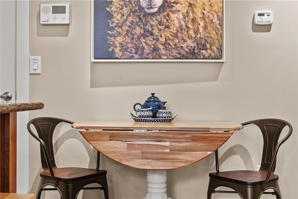 706 Ivy Street, Unit 2 Pittsburgh, PA 15232 - Photo 16 of 35 a dining table with a rug