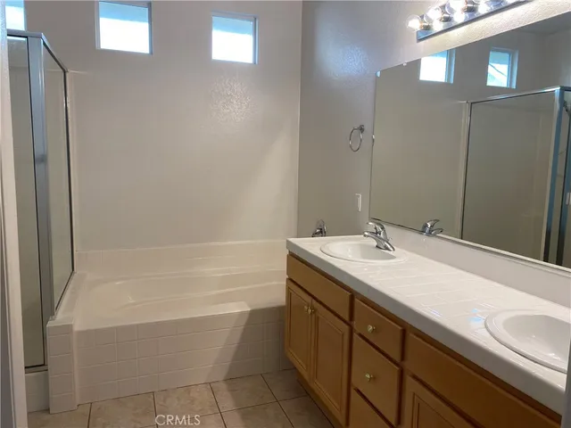 a bathroom with a sink and a bathtub