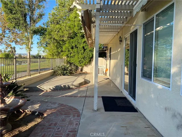 a view of balcony with furniture