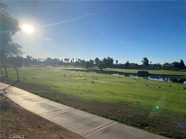 a view of a lake with a big yard