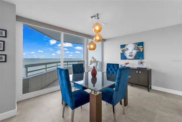 a kitchen with stainless steel appliances kitchen island granite countertop a sink and cabinets