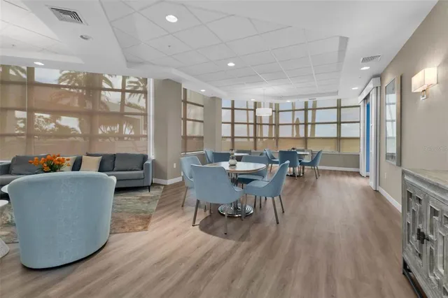 a view of a swimming pool with a chairs