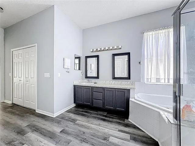 a view of backyard with small cabin