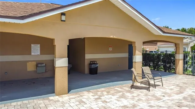 a view of an outdoor space pool patio and lake view