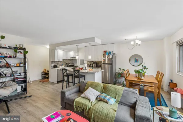 a living room with furniture and a table