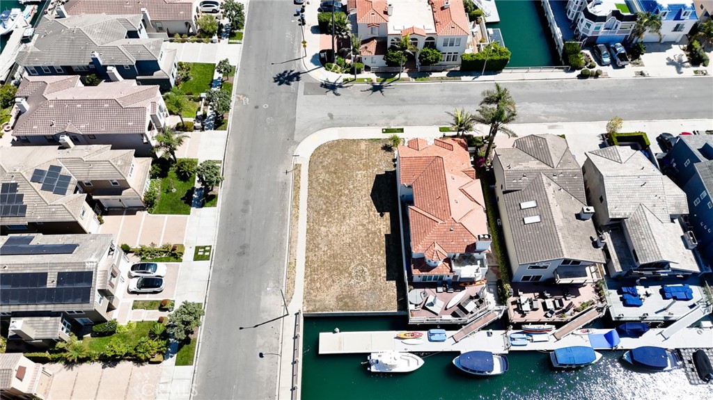 an aerial view of multiple houses with outdoor space