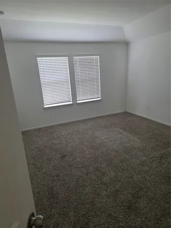 a bathroom with a sink vanity and mirror