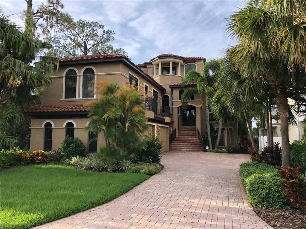 5505 Manatee Point Drive New Port Richey, FL 34652 - Photo 1 of 1 a front view of house with yard and green space