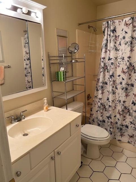 221 Lake Meryl Drive West Palm Beach, FL 33411 - Photo 11 of 31 a bathroom with a sink toilet and shower