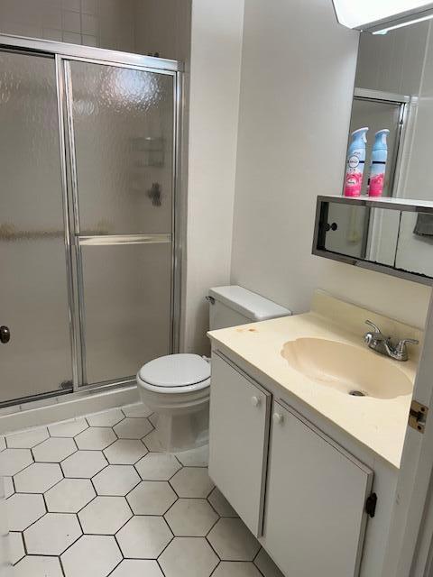 221 Lake Meryl Drive West Palm Beach, FL 33411 - Photo 14 of 31 a bathroom with a sink toilet and shower