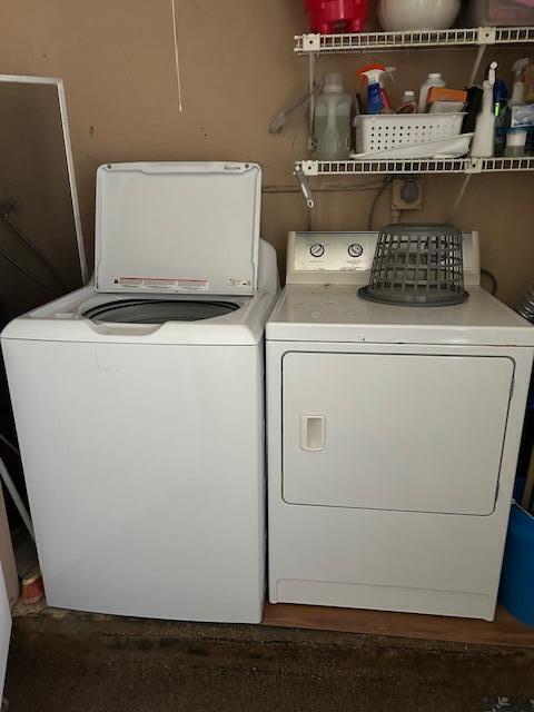 221 Lake Meryl Drive West Palm Beach, FL 33411 - Photo 16 of 31 a utility room with dryer and washer