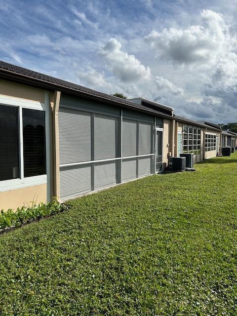 221 Lake Meryl Drive West Palm Beach, FL 33411 - Photo 17 of 31 a house view with a garden space